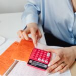 a person using a calculator