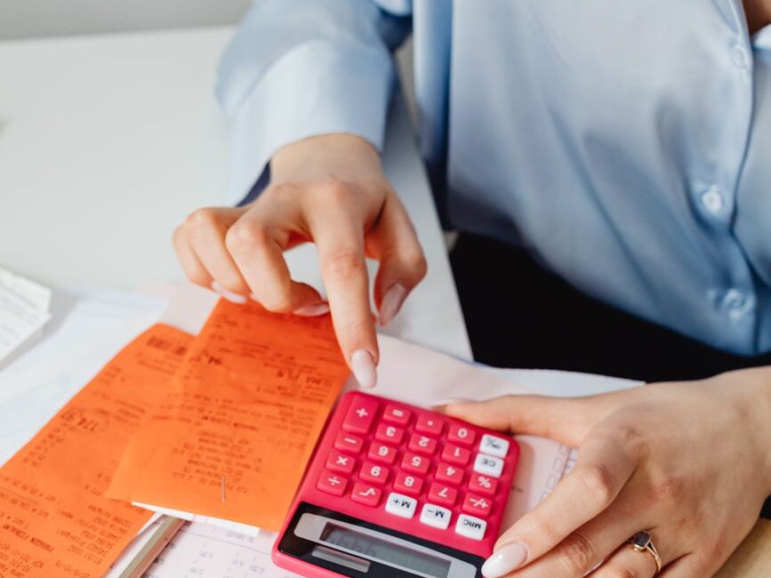a person using a calculator